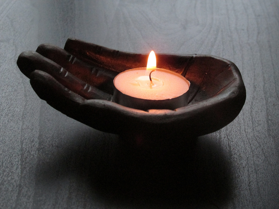 Zen Candle on a Wooden Hand Carving